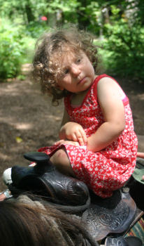 baby on horseback